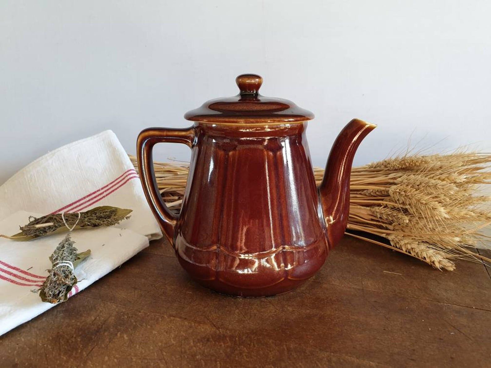 Vintage tea maker in old-fashioned country house-style earthenware