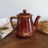 Vintage tea maker in old-fashioned country house-style earthenware