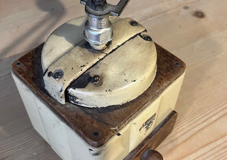 Peugeot coffee grinder in cream lacquered metal