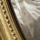 Antique oval gilded mirror – Louis XVI style with ribbon bow