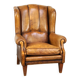 Sheepskin wingback chair with a unique design and a beautiful patina