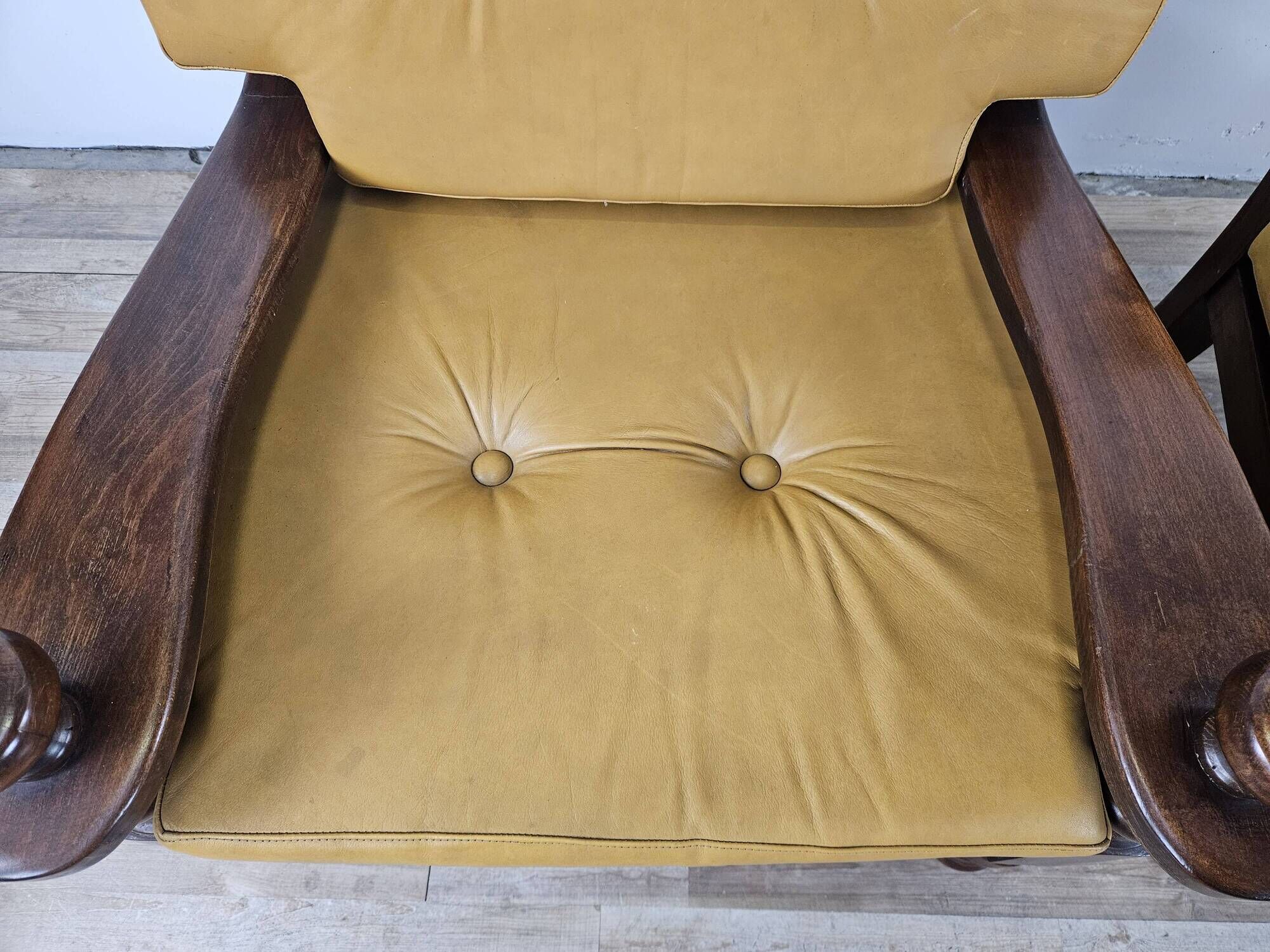 1980s leather and solid wood armchairs