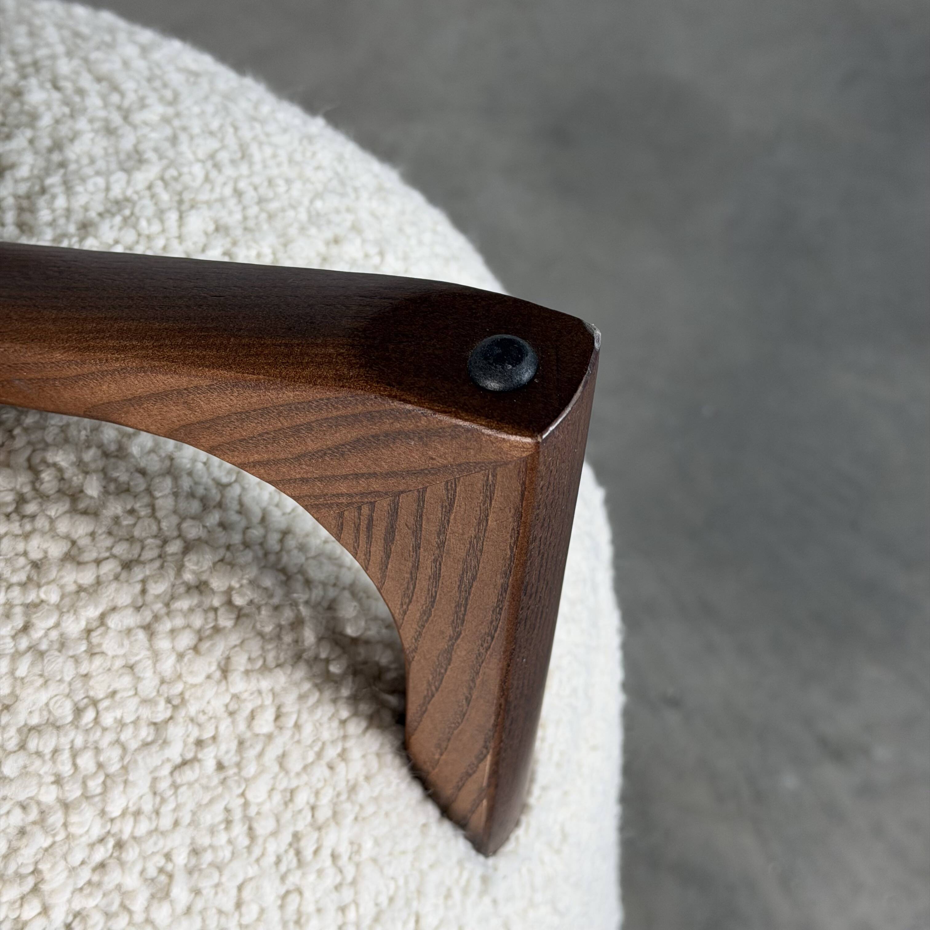 TOTEMO stools by FORME with ivory Dedar bouclé upholstery and walnut legs.