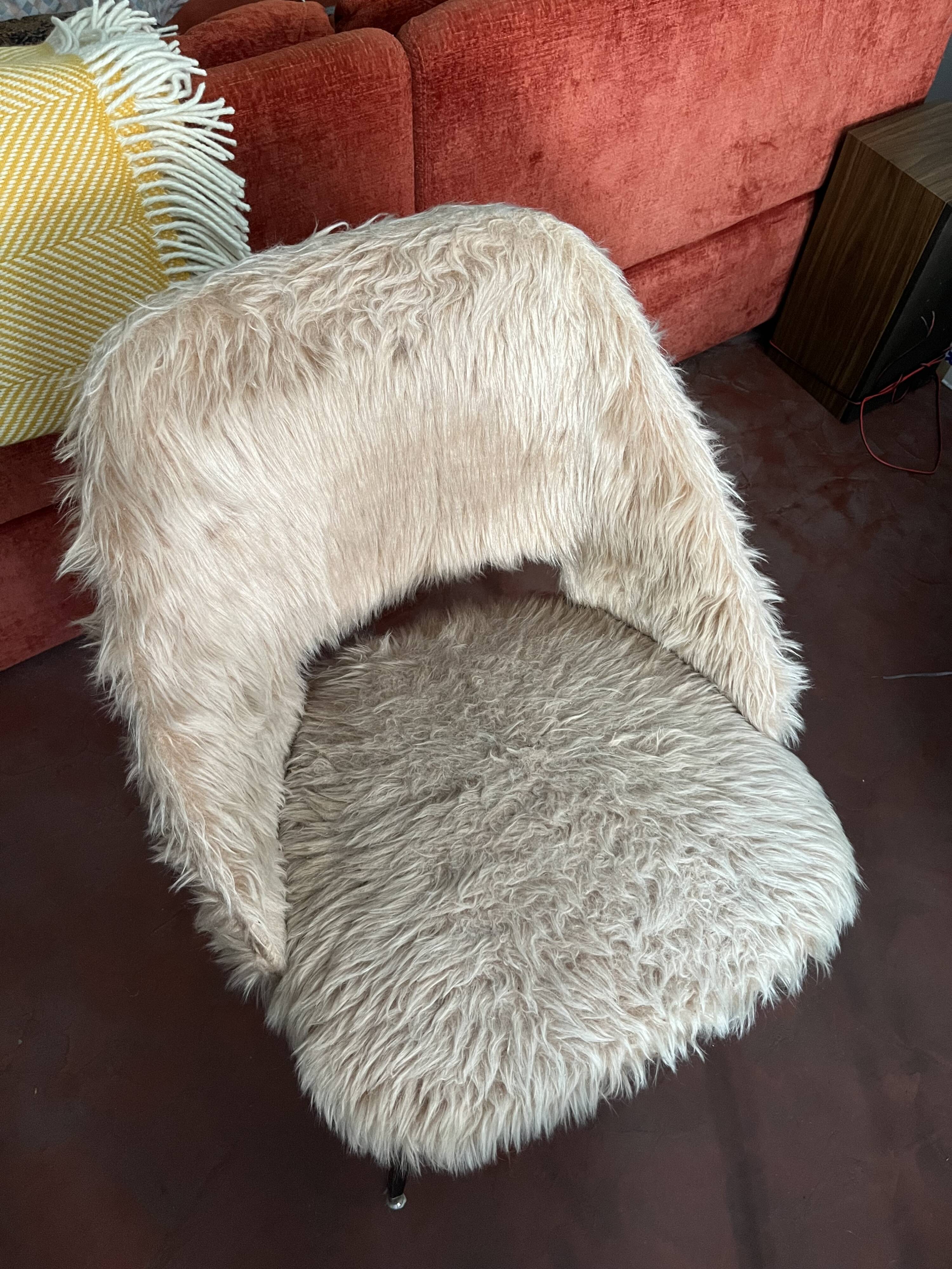 70s faux fur chair with tapered legs in powder pink