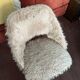 70s faux fur chair with tapered legs in powder pink