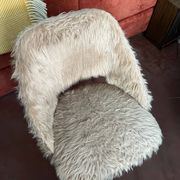 70s faux fur chair with tapered legs in powder pink