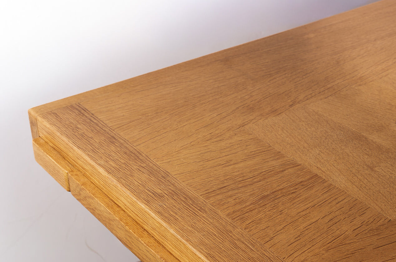 Large extendable dining table in oak by Guillerme and Chambron 1960.