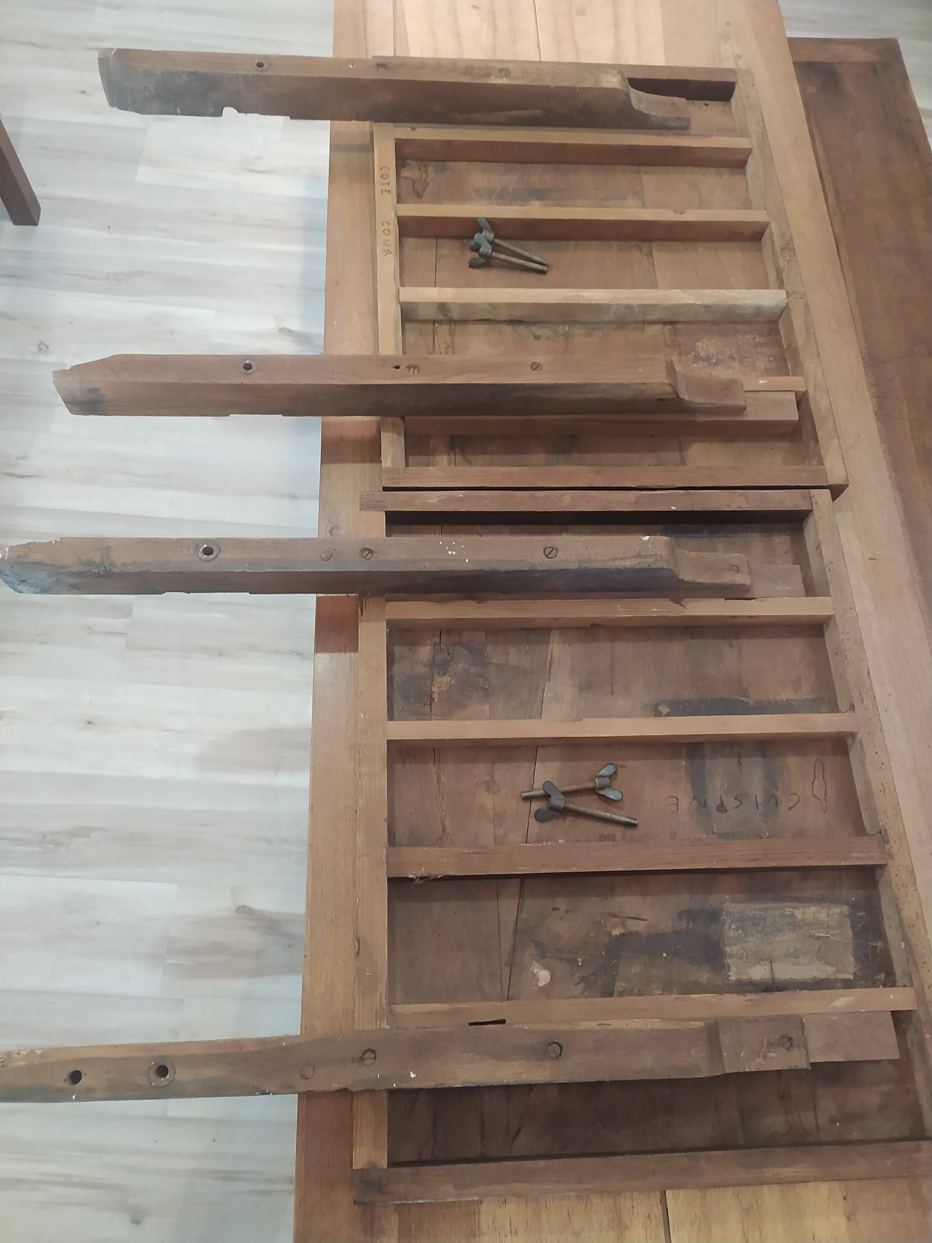 Old farmhouse table in solid walnut from the 19th century, benches, extensions, Ardèche.