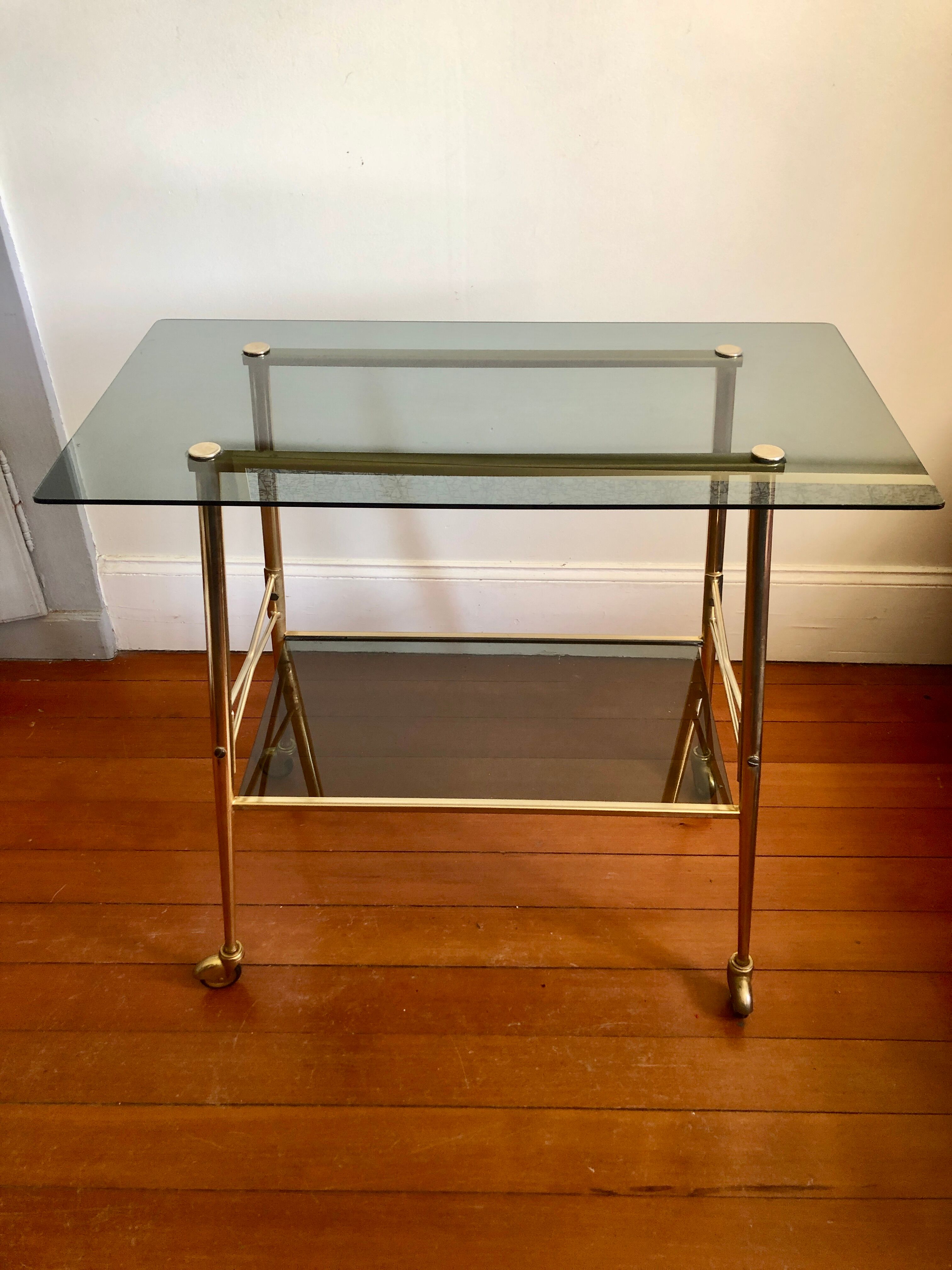 Smoked glass and gilded brass trolley