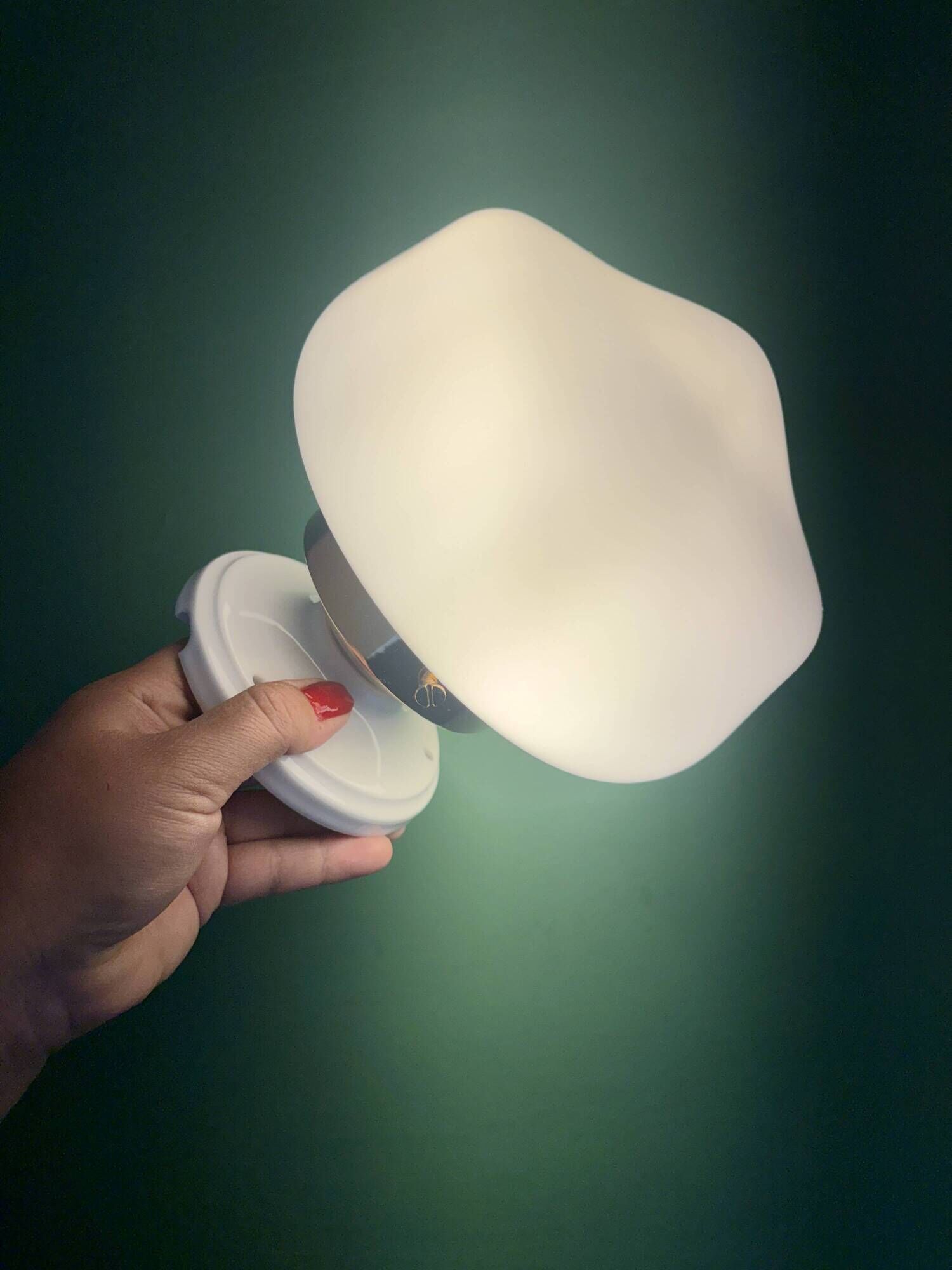 Vintage Art Deco globe wall light in white opaline.