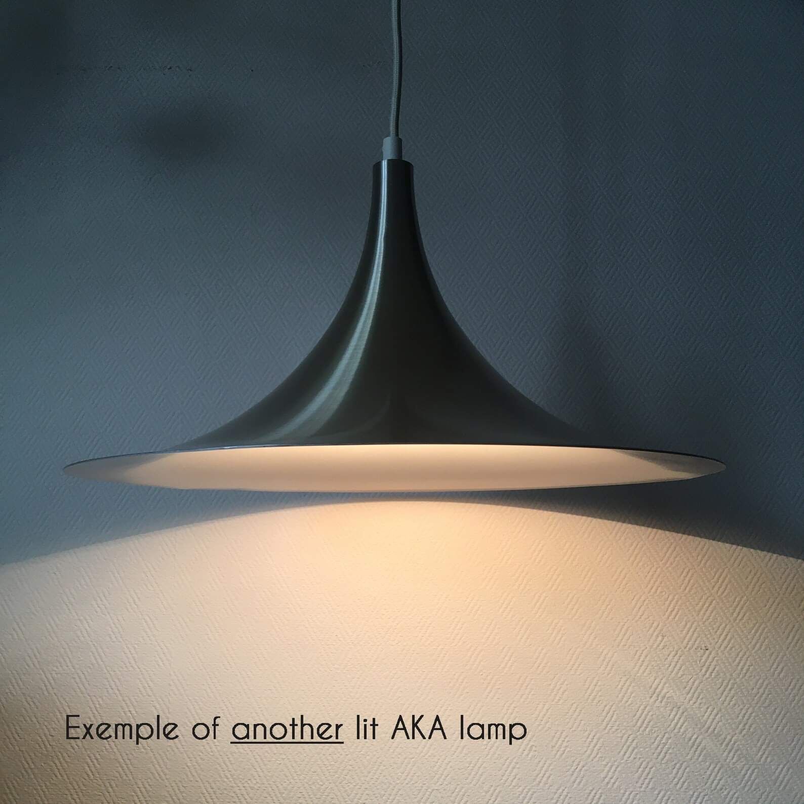 White "trumpet" lamp from the 1960s by the manufacturer AKA.