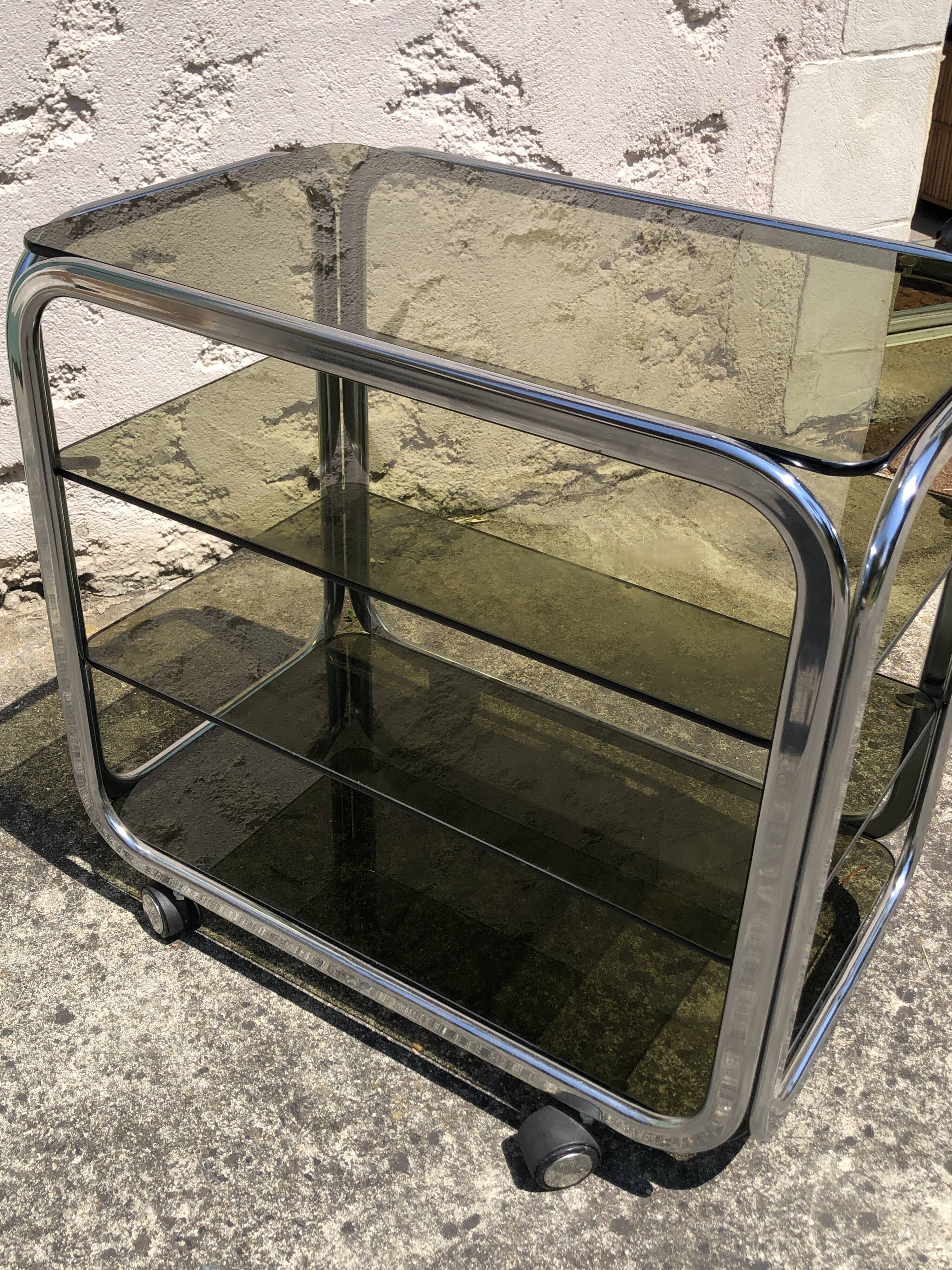 Chrome furniture and smoked glass 1970