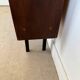 Vintage veneer bookcase with metal legs