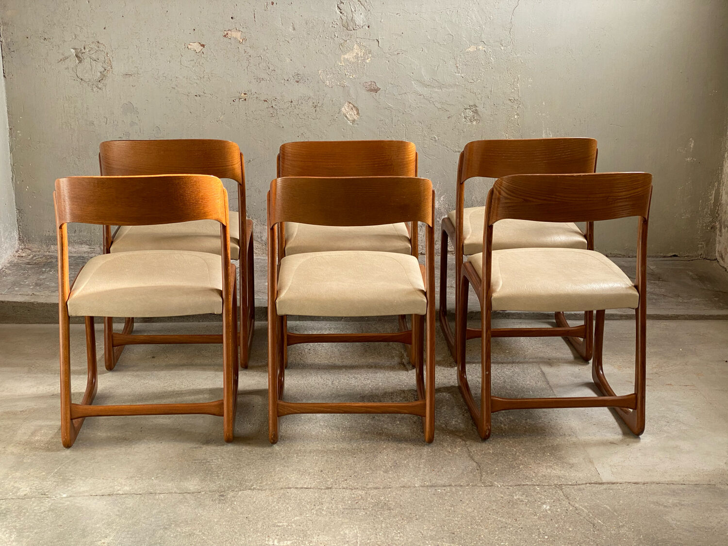 6 Baumann chairs foot sled