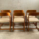 6 Baumann chairs foot sled