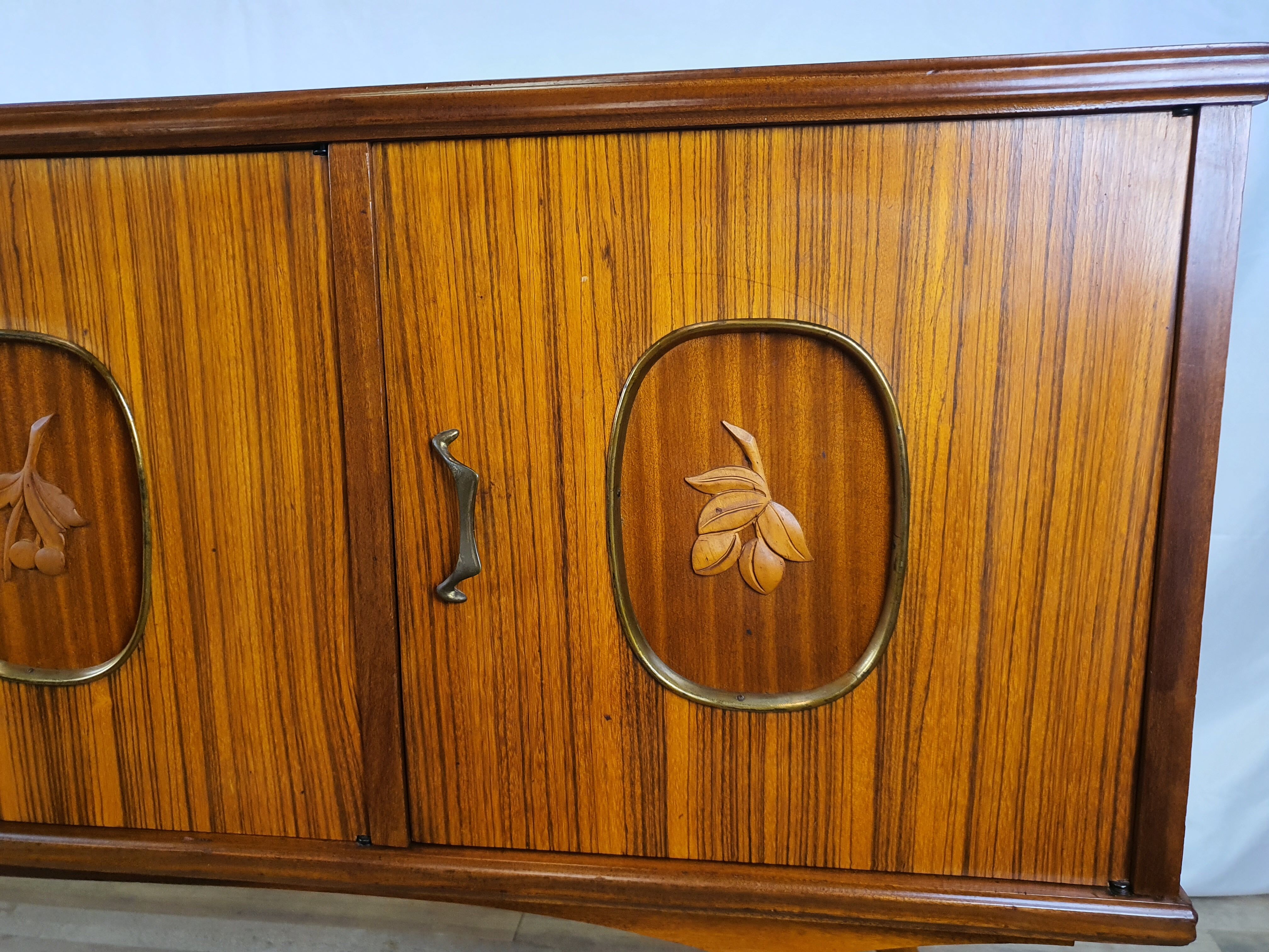 1960s sideboard with decorated doors in wood and brass