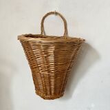 Braided wicker wall basket