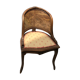 Old wooden armchair and cannage