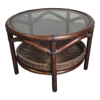 Vintage rattan coffee table with smoked glass top and rattan basket shelf