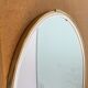 Free-form oval sheathed mirror from the 60s and 70s