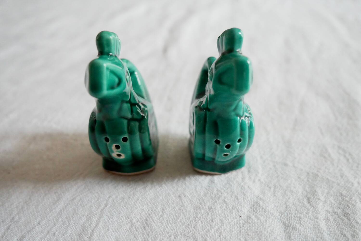 Slush salt and pepper shakers in the shape of a green rooster