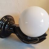 Hand-shaped wall light