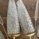 Pair of wall sconces from the 60s, gold metal and tulips.
