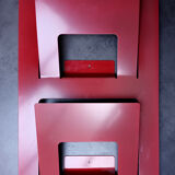 Vintage red metal wall magazine rack