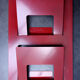 Vintage red metal wall magazine rack