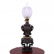 Pair of bronze oil lamps, France, circa 1880.