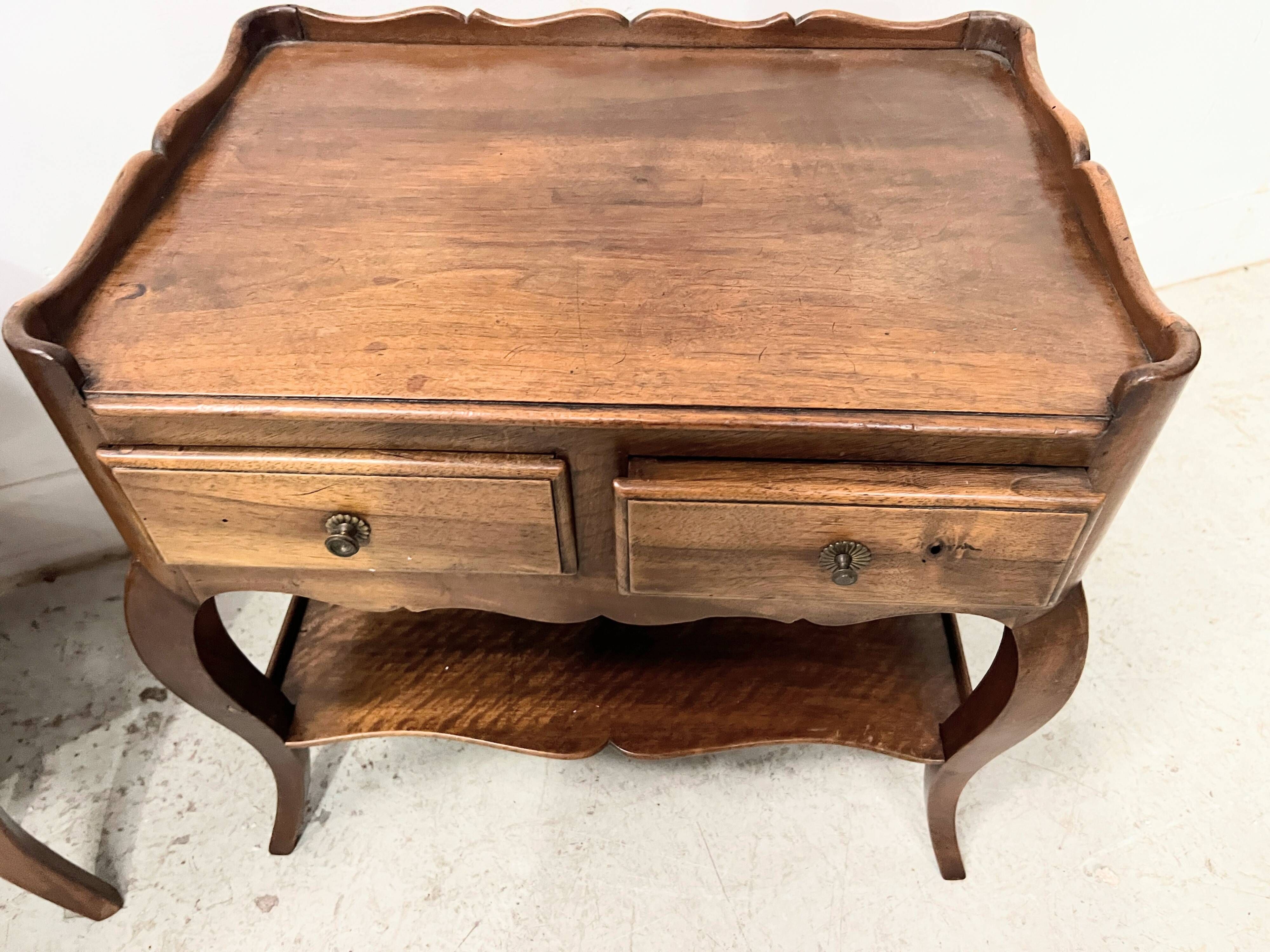 Louis XV style bedside table in solid walnut, 20th century.