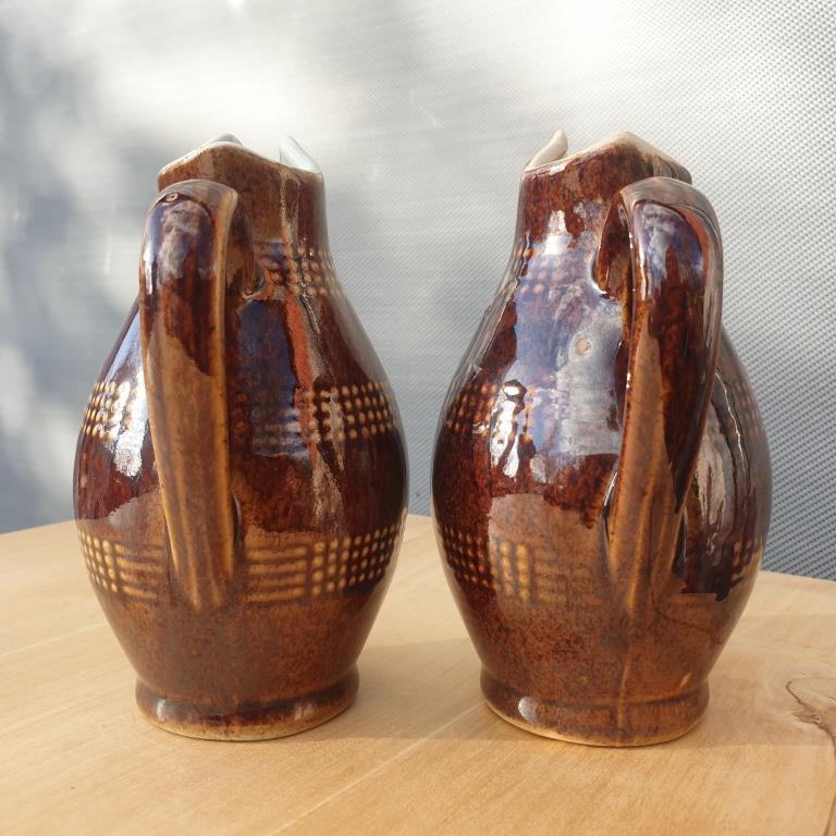 Pair of Renault sandstone pitchers pourers of the 7 dwarfs