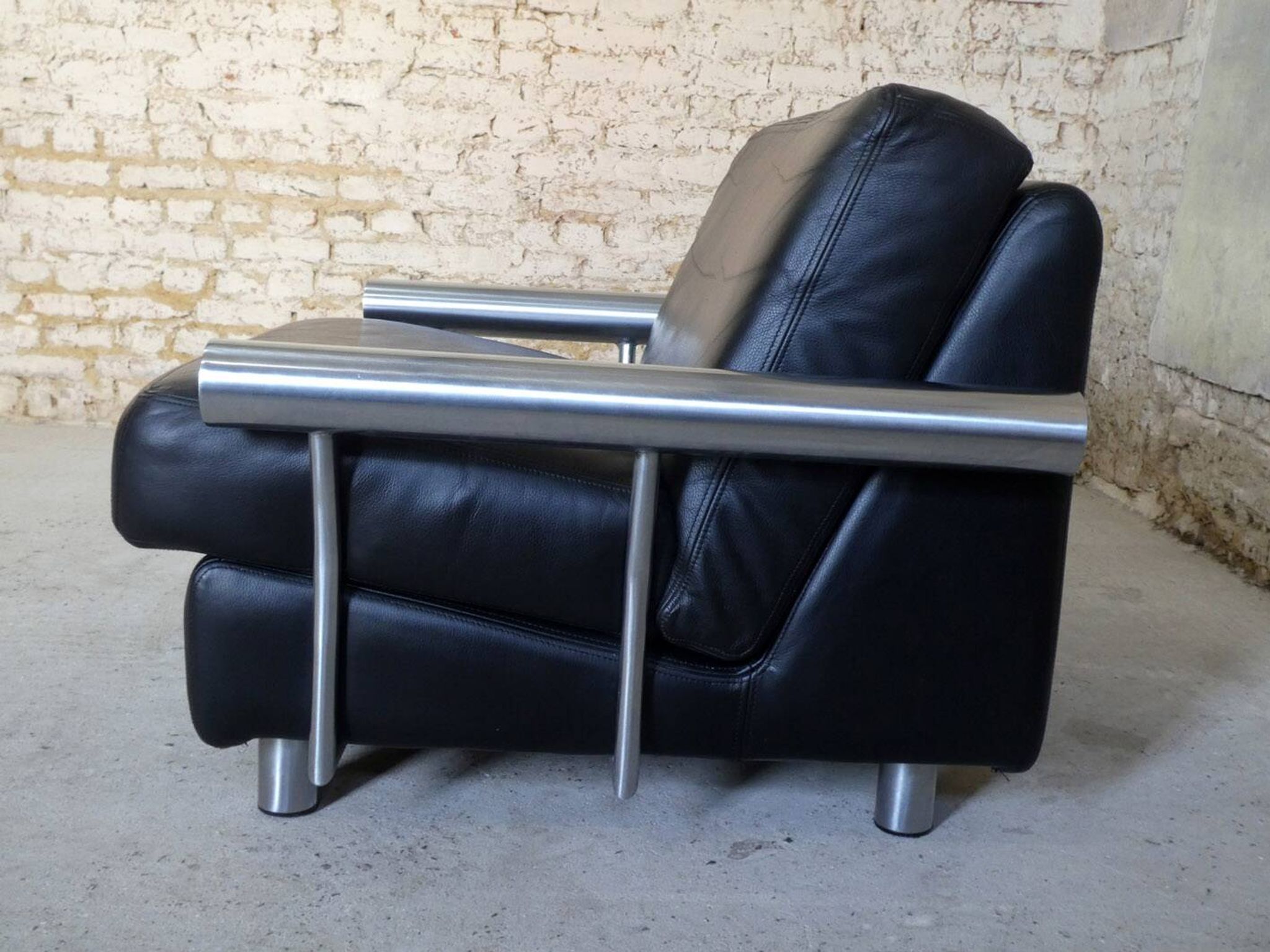 pair of armchairs, black leather & stainless steel, 1990