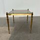 Mid-century German Hollywood neoclassical brass and glass side table from the 1950s.