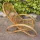 Curved bamboo and rattan armchair in Italian style by Roberti from the 1960s.