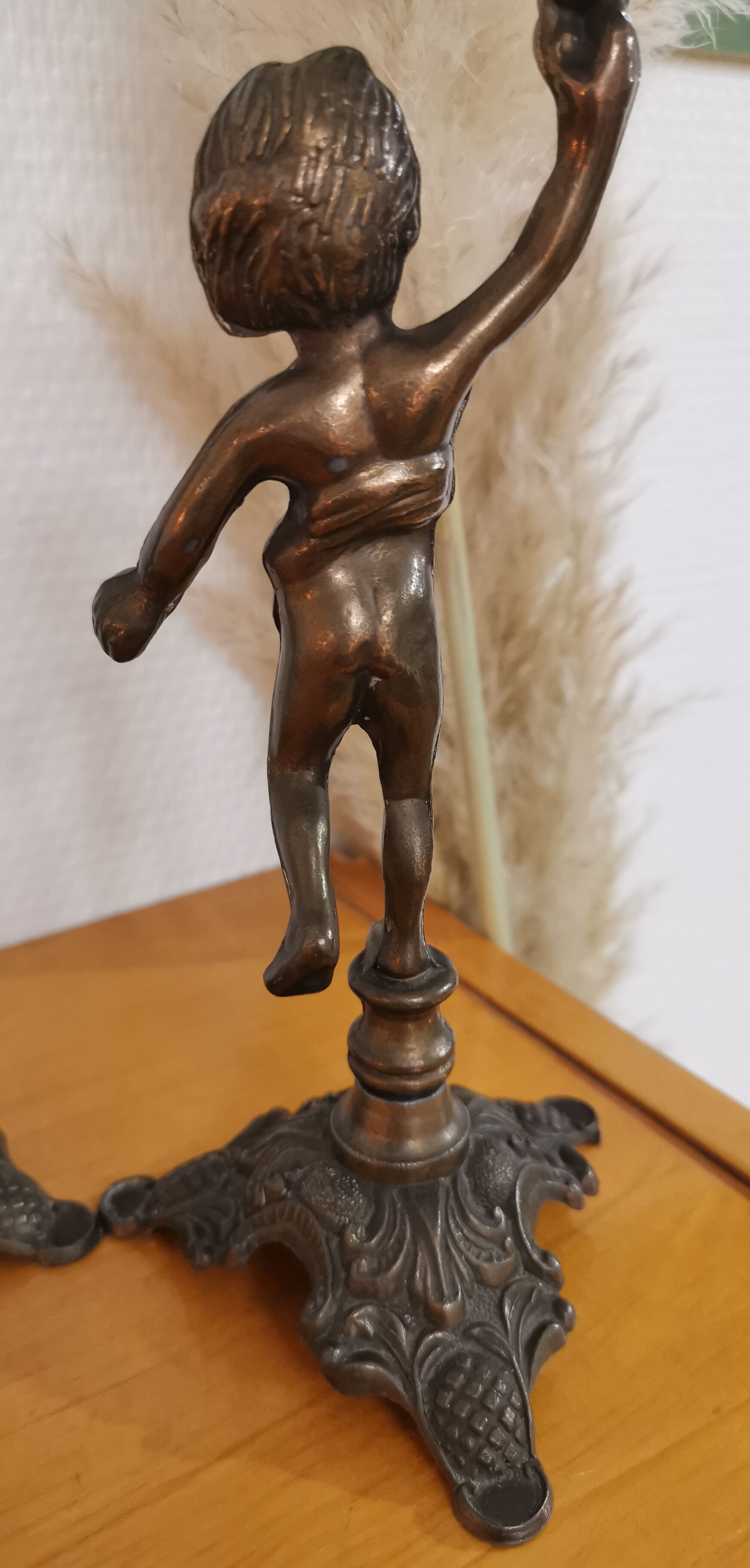 Pair of antique candlesticks in bronze and brass