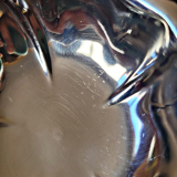 Stainless steel ice bowls by Guy Degrenne, low bowls in the shape of a flower.