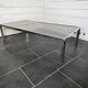 Chromed metal coffee table with smoked glass top from the 70s