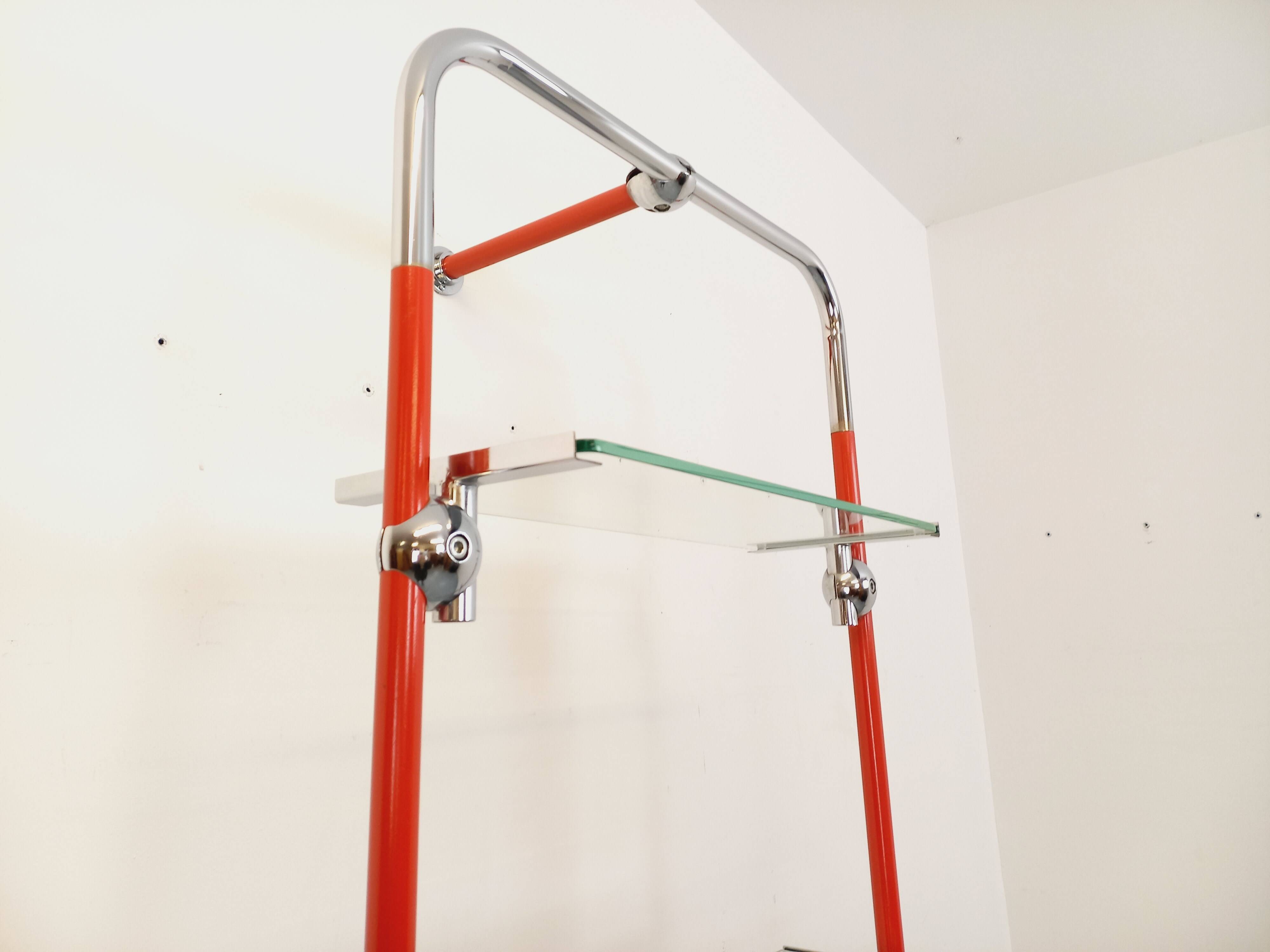 Modular bookshelf in vintage Bauhaus style, red metal, chrome.