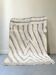 Large hand-knotted beige and cream Berber rug, 2.90m x 1.80m.