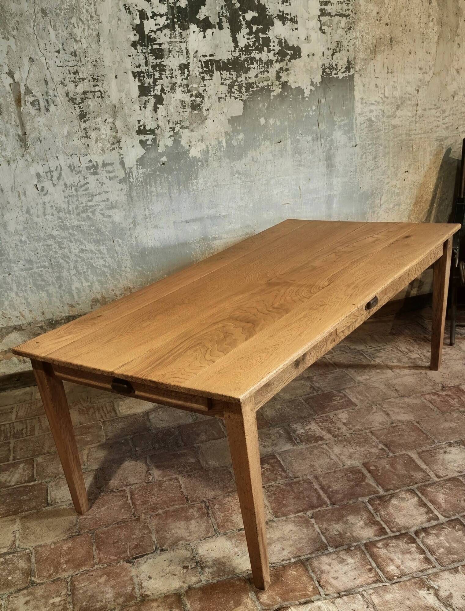 Large authentic farmhouse table made of solid French oak.