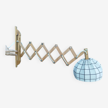 Articulated arm scissor wall light