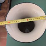 Large vintage antique vase with raised floral pattern.