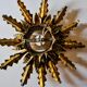 Brutalist sun wall lamp, metal and gold leaf, Italy, 1960