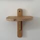 Small wall-mounted wooden shelf