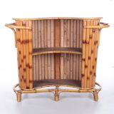 Vintage bamboo Tiki bar cocktail bar with 2 bar stools.