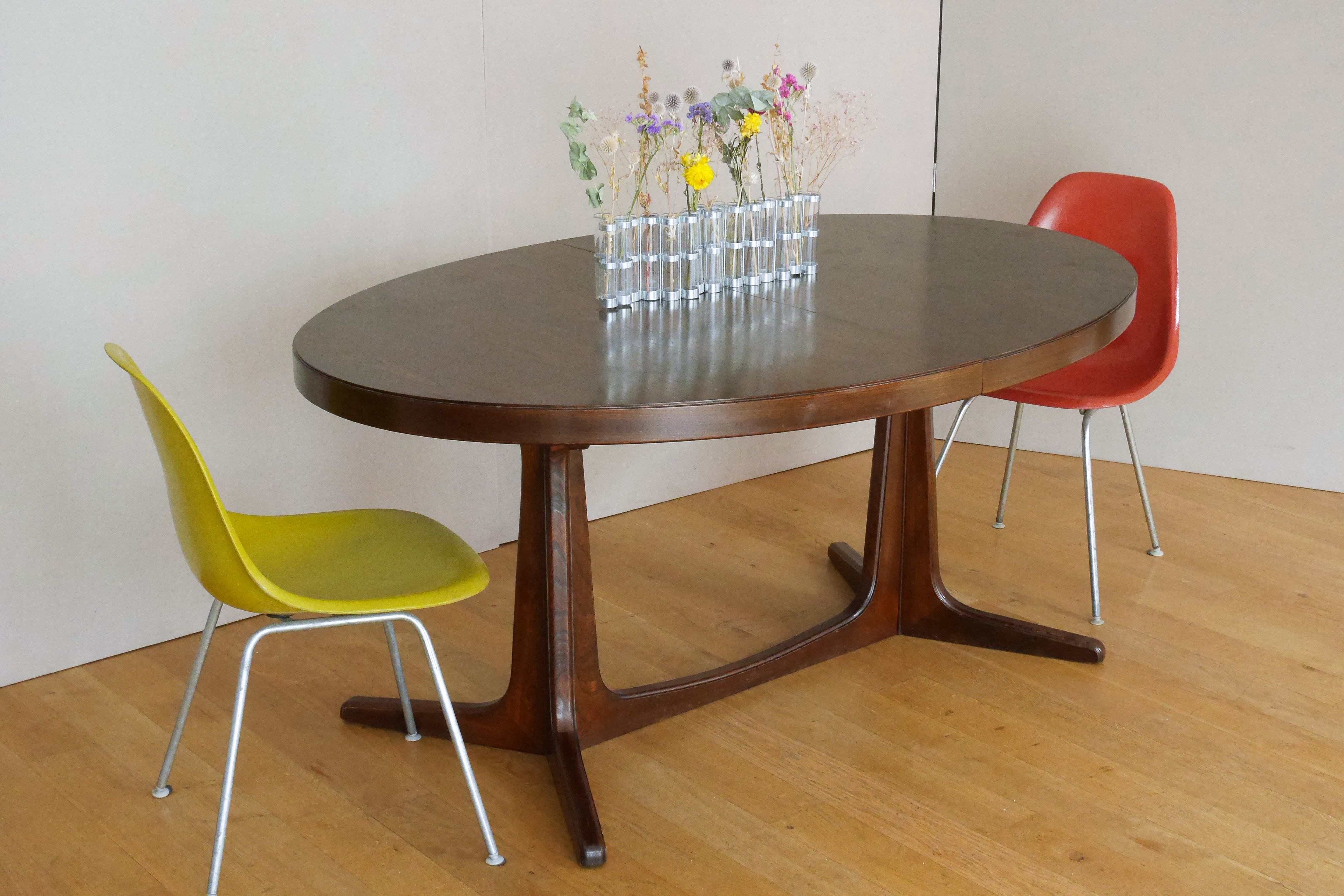 Extendable oval elm table with Baumann extensions
