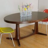 Extendable oval elm table with Baumann extensions