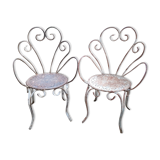 Duo of iron lawn chairs