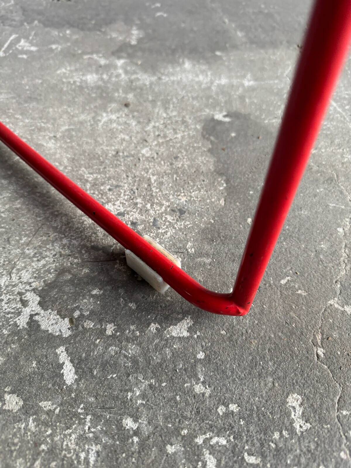 Red powder-coated steel Omstak chair by Rodney Kinsman for Bieffeplast — 1980 industrial design
